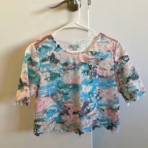 Watercolor lace top with zipper shoulder detail, size M